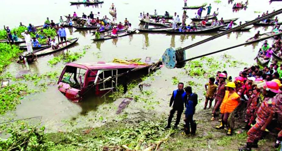 Two persons were killed and 17 others injured when a passenger bus skidded off into a road side water body at Shologhar in Munshiganj on Dhaka-Mawa Highway on Friday.
