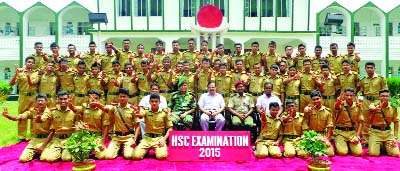 JHEDIDAH: Jubilant students of Jhenidah Cadet College showing V-sign after announcing HSC results on Sunday.