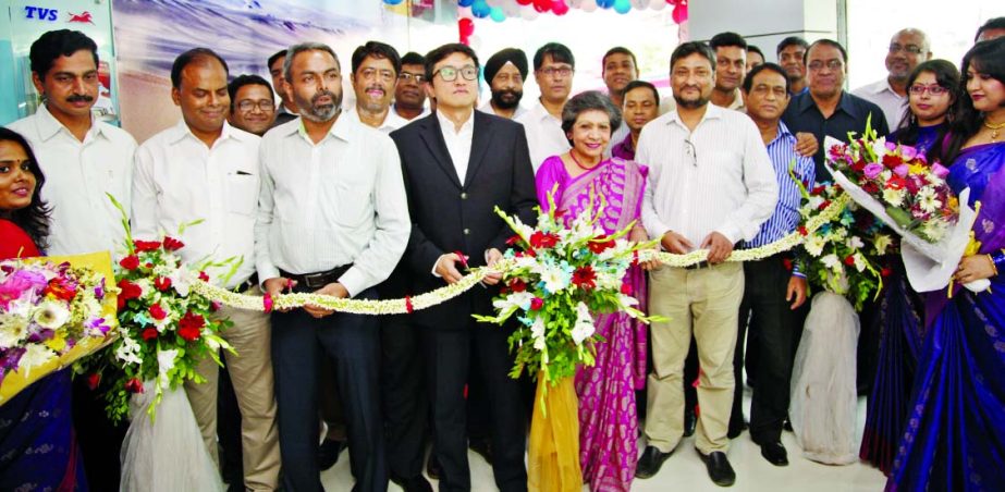 J Ekram Hussain, Managing Director of TVS Auto Bangladesh, inaugurating new show room at Tejgaon Industrial Area in the city on Sunday.