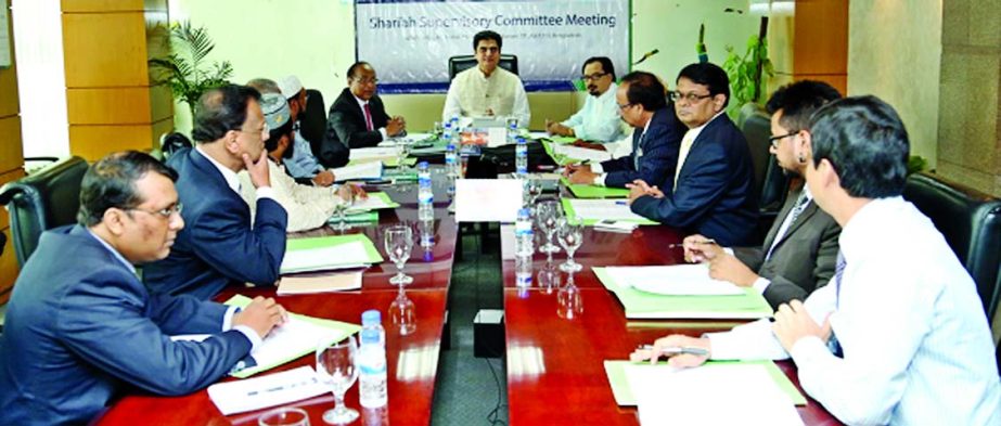 Dr HBM Iqbal, Chairman of the Board of Directors of Premier Bank Limited, presiding over the 30th meeting of the Shari'ah Supervisory Committee at the bank's head office on Monday. Khondker Fazle Rashid, Managing Director of the bank was present.