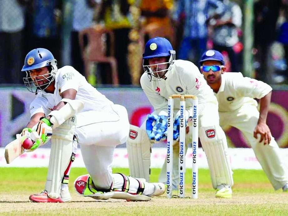 Dinesh Chandimal played a wonderful knock as Sri Lanka fought hard on day three of the first Test against India at Galle in Sri Lanka on Friday.