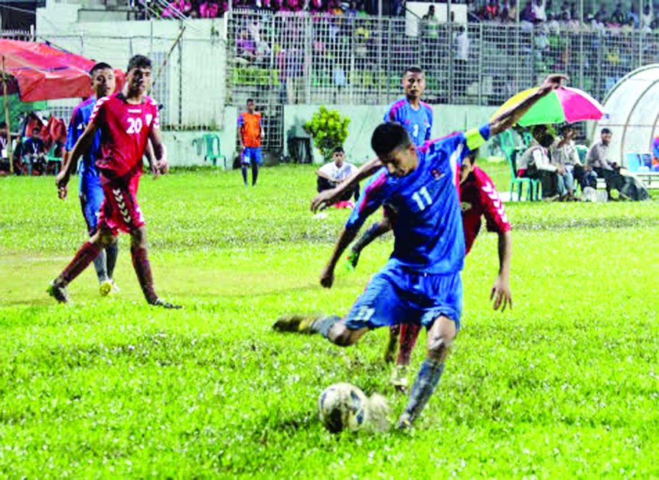 An action from the match of the SAFF Under-16 Championship between Nepal Under-16 Football team and Afghanistan Under-16 Football team at the Sylhet Stadium on Friday.