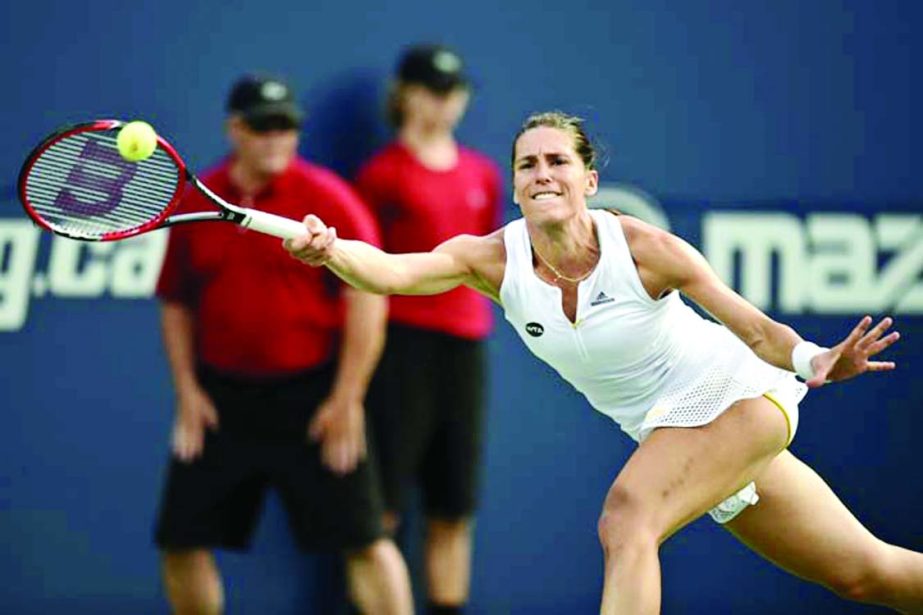 Andrea Petkovic of Germany returns to Serena Williams of the United States at the Rogers Cup tennis tournament in Toronto on Thursday.