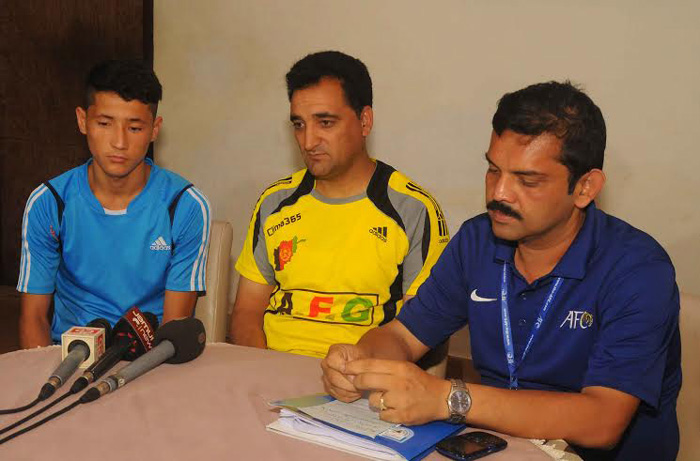 Head Coach of Afghanistan Under-16 Football team Md Isa Jahid (center) speaking at a press conference at the Sylhet Stadium on Saturday.