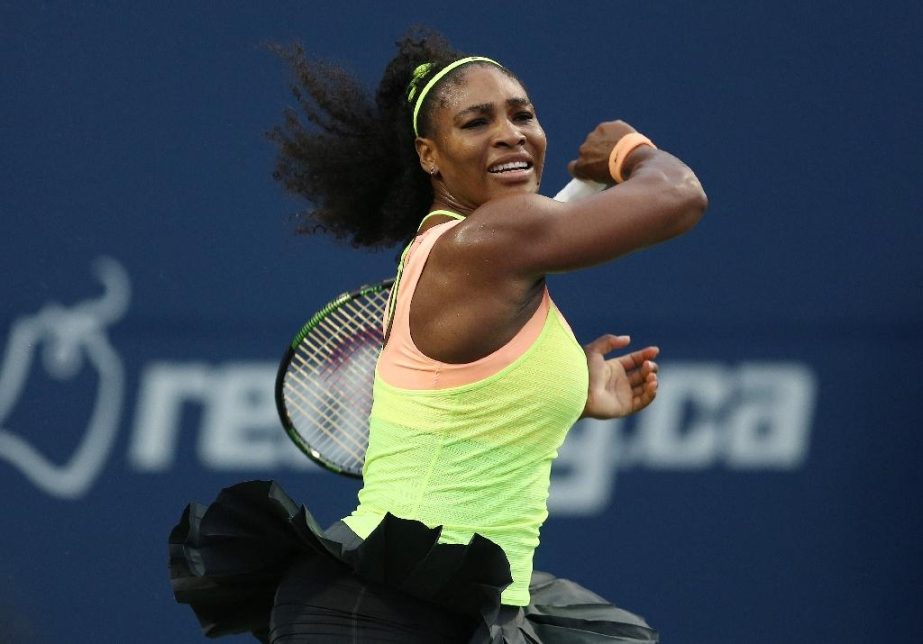 Serena Williams of the US plays a shot against Roberta Vinci of Italy during the quarter-finals of the Rogers Cup in Toronto, Canada on Friday.