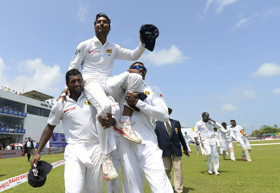 Kumar Sangakkara is carried on a lap of honour on the 4th day of 1st Test between Sri Lanka and India at Galle on Saturday.