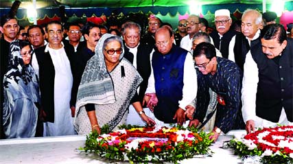 Awami League President and Prime Minister Sheikh Hasina along with her sister Sheikh Rehana and senior leaders of the ruling party paid tributes to Bangabandhu Sheikh Mujibur Rahman by placing wreaths at the Mazar at Tungipara marking the National Mournin