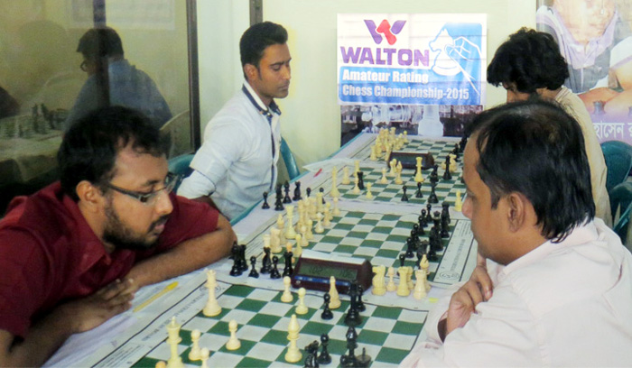 A scene from the Walton 1st Amateur International Rating Chess Championship at the Bangladesh Chess Federation hall-room on Sunday.