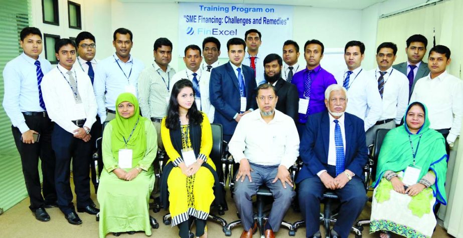Mirza Aminur Rahman, Director of Financial Excellence Limited posing with the participants of a two-day training programme on "SME Financing: Challenges and Remedies" recently.