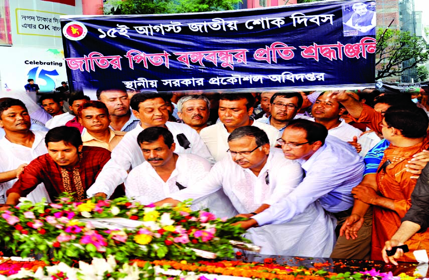 LGED Chief Engineer Shyama Prosad Adhikari placing floral wreaths at the portrait of Bangabandhu at Dhanmondi in the city marking the National Mourning Day on 15th August.