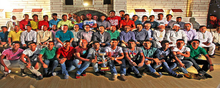 Sheikh Russel Krira Chakra Chairman and Bashundhara Group Managing Director Sayem Sobhan Anvir poses with club footballers and officials at a reception in a city hotel on Monday. Sheikh Russel KC became Manyavar Bangladesh Premier League runners-up after