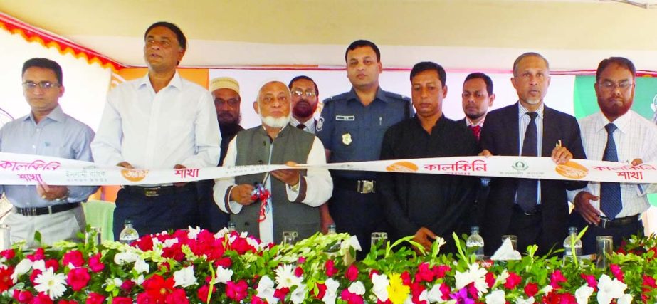 Enrg Md Eskander Ali Khan, EC Chairman of Islami Bank Bangladesh Limited, inaugurating its 296th branch at Kalkini upazila in Madaripur on Thursday. Muhammad Abul Bashar, DMD of the bank presided.