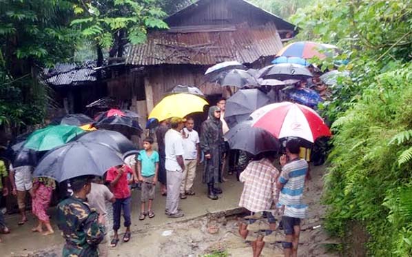 A view of landslide caused by heavy rains at Bandarban that killed a child yesterday.