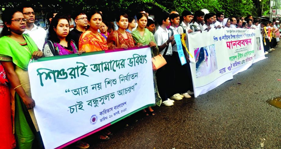 Karitas Bangladesh formed a human chain in front of the Jatiya Press Club on Thursday with a call to stop repression on children.