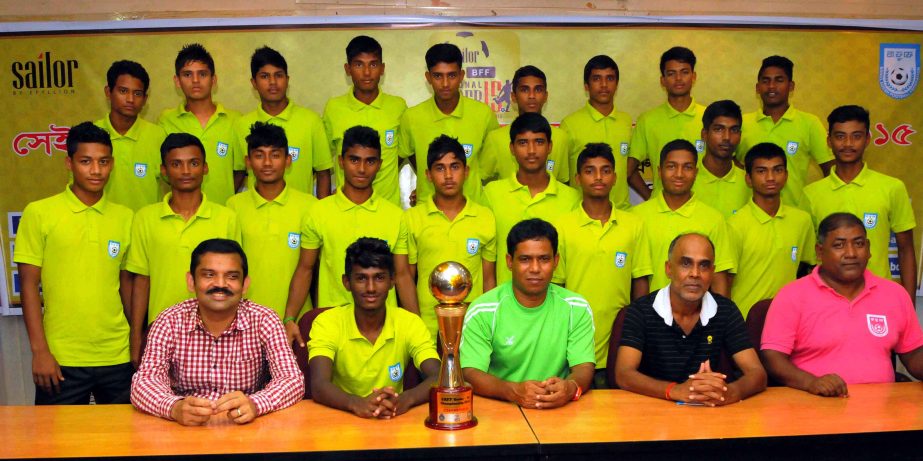 Members of Bangladesh Under-16 Football team, the champions of the SAFF Under-16 Championship pose with the trophy at the BFF House on Thursday.