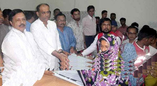 State Minister for Land Saifuzzaman Chowdhury Javed speaking as Chief Guest at the relief goods distribution programme at Anowara Upazila Parishad office on Thursday evening.