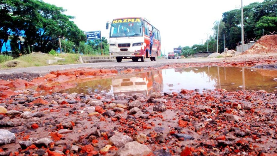 Dilapidated condition of the road at Kumora Bypass area of Sitakundo Upazila in Dhaka- Chittagong Highway needs immediate repair.