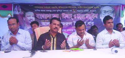 ARIHAJAR (Narayanganj): Alhaj Nazrul Islam Babu MP , Arihajar Upazila offering Munajat at a discussion meeting and Doa Mahfil organised by Arihajar Dolil Lekhhak Samity on the occasion of the National Mourning Day recently.