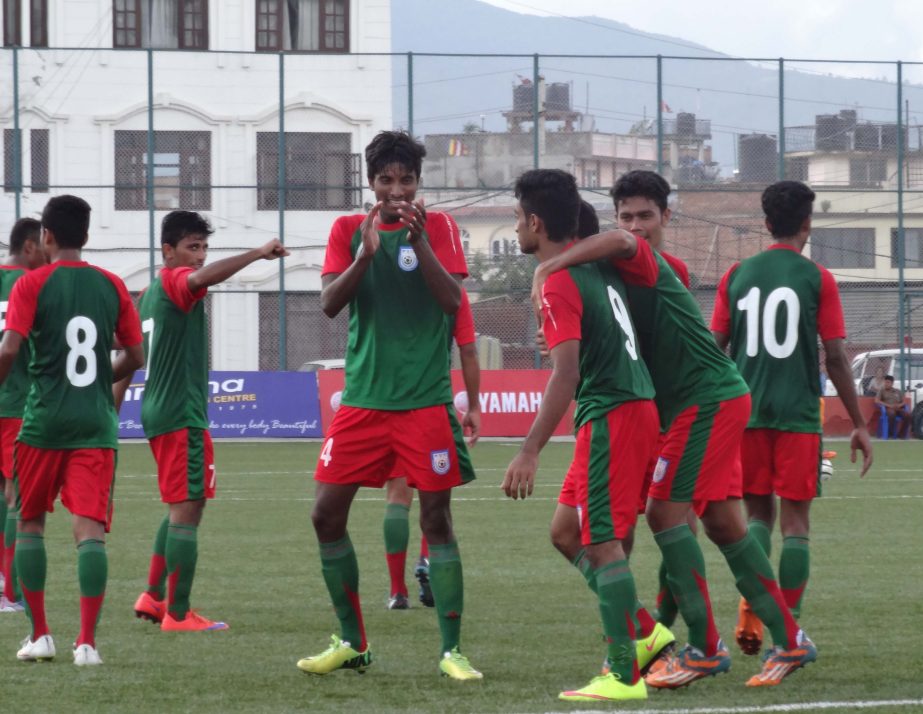 Players of Bangladesh Under-19 National Football team celebrating after scoring a goal against Bhutan Under-19 National Football team in their match of the SAFF Under-19 Championship at Kathmandu in Nepal on Saturday.