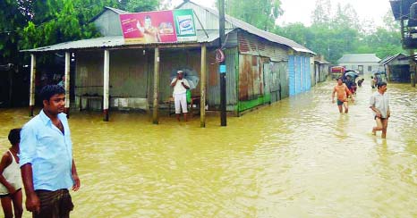 SHERPUR: Some 17 villages in Jhenigathi Upazila have been flooded by hilly waters. This picture was taken on Saturday.