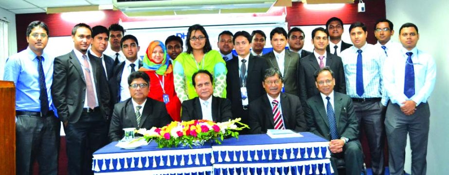 Niaz Habib, Managing Director of Dhaka Bank, poses with the participants of a three-week long Foundation Training Program of the bank at its training institute on Sunday.