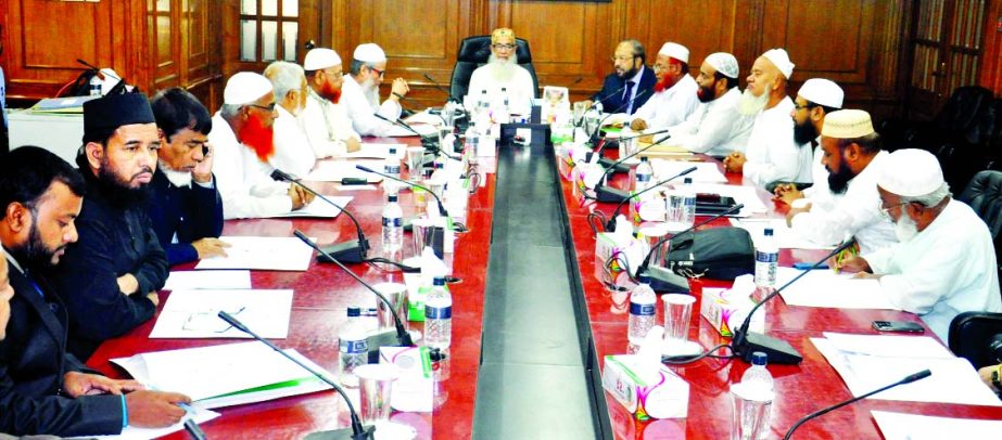 Sheikh Moulana Mohammad Qutubuddin, Chairman of the Shari`ah Supervisory Committee of Islami Bank Bangladesh Limited and President of Baitush Sharaf Anjuman-E-Ittehad Bangladesh, presiding over its meeting at Islami Bank Tower on Monday.