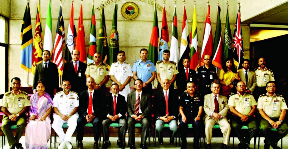 Prime Minister's International Relations Affairs Adviser Dr Gowher Rizvi poses for photograph with the participants of a seminar titled 'The Foreign Policy Imperatives with Special Emphasis on Bangladesh' at NDC, Mirpur Cantonment in the city on Monday