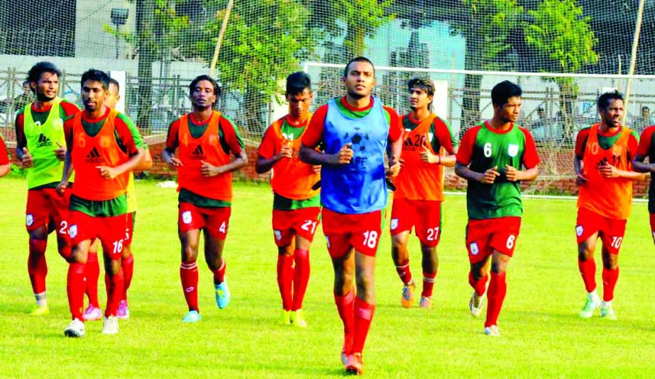 Members of Bangladesh National Football team during their practice session at the Sheikh Jamal Dhanmondi Club Limited Ground on Tuesday.