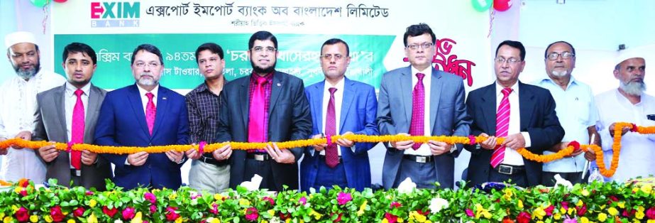 Md Nurul Amin Faruq, Director of EXIM Bank, inaugurating its 94th branch at Charbata Khaserhat in Noakhali on Tuesday. Managing Director of the bank Dr Mohammed Haider Ali Miah presided.