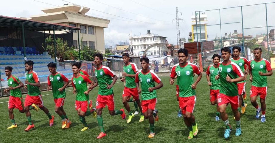 Members of Bangladesh National Under-19 Football team during their practice session at Kathmandu in Nepal on Wednesday.