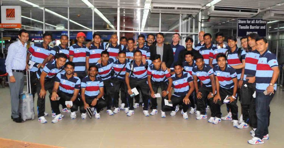 Members of Bangladesh National Football team pose for a photo session at the Hazrat Shahjalal International Airport on Thursday.