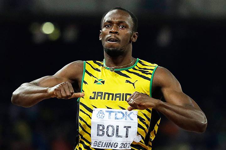 Jamaica's Usain Bolt celebrates after winning the men's 200m final at the World Athletics Championships at the Bird's Nest Stadium in Beijing on Thursday.