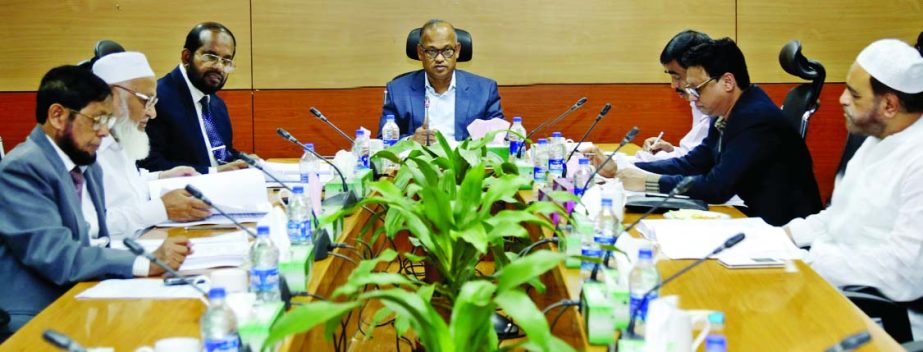 Abdus Samad, Chairman of the Executive Committee of the Board of Directors of Al-Arafah Islami Bank Limited, presiding over the 500th meeting at its board room on Thursday.