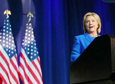 Democratic presidential candidate Hillary Clinton addresses the Democratic National Committee (DNC) Summer Meeting in Minneapolis, Minnesota n Friday.