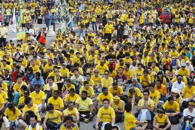 Activists from the Coalition for Clean and Fair Elections (BERSIH) gather on a main road in downtown Kuala Lumpur, Malaysia, during a rally on Sunday.