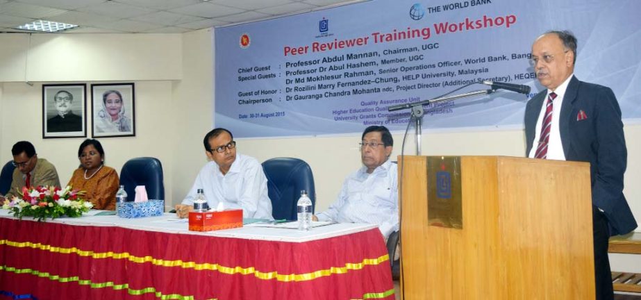 UGC Chairman Prof Abdul Mannan speaks at a 'Peer Reviewers' Training Workshop' organized by Higher Education Quality Enhancement Project (HEQEP), UGC at UGC auditorium on Sunday.