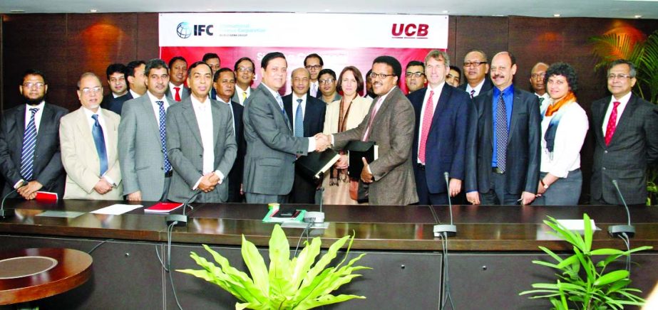 Muhammed Ali, Managing Director of United Commercial Bank Limited and Mengitsu Alemayehu, Director, South Asia of International Finance Corporation, sign agreement of financing $75m in three modes: GTFP, WCSS STF and SEF Remediation for RMG industries at