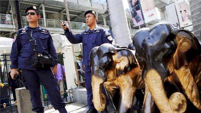 The police operations are in connection with the bombing at the Erawan shrine in Bangkok .