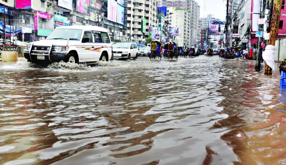 City's Shantinagar area submerged in a short spell of rain due to absence of proper drainage causing sufferings to commuters on Monday.