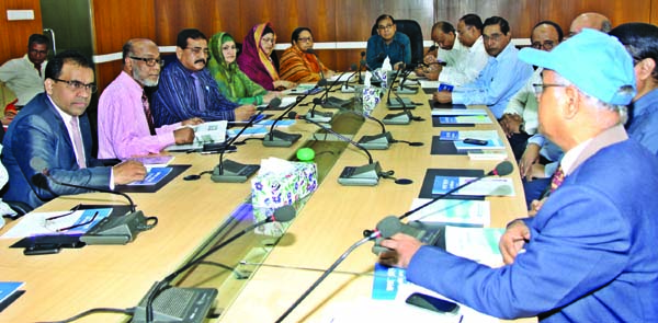 Md Abdus Salam, Managing Director of Janata Bank, presiding over the workshop on "Janata Bank Green Communication" at its committee room on Tuesday. Md Afzalul Bashar, GM of Research and Planning Division of the bank moderated.