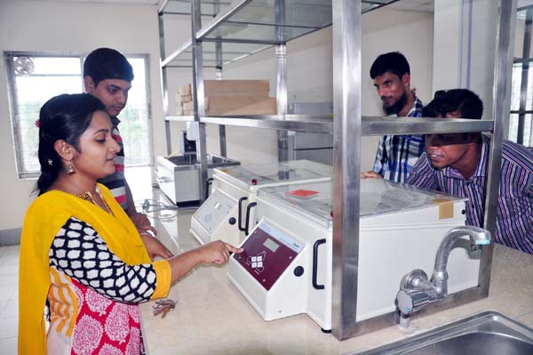 Students of the German University Bangladesh working at a laboratory of the university as a part of their study.