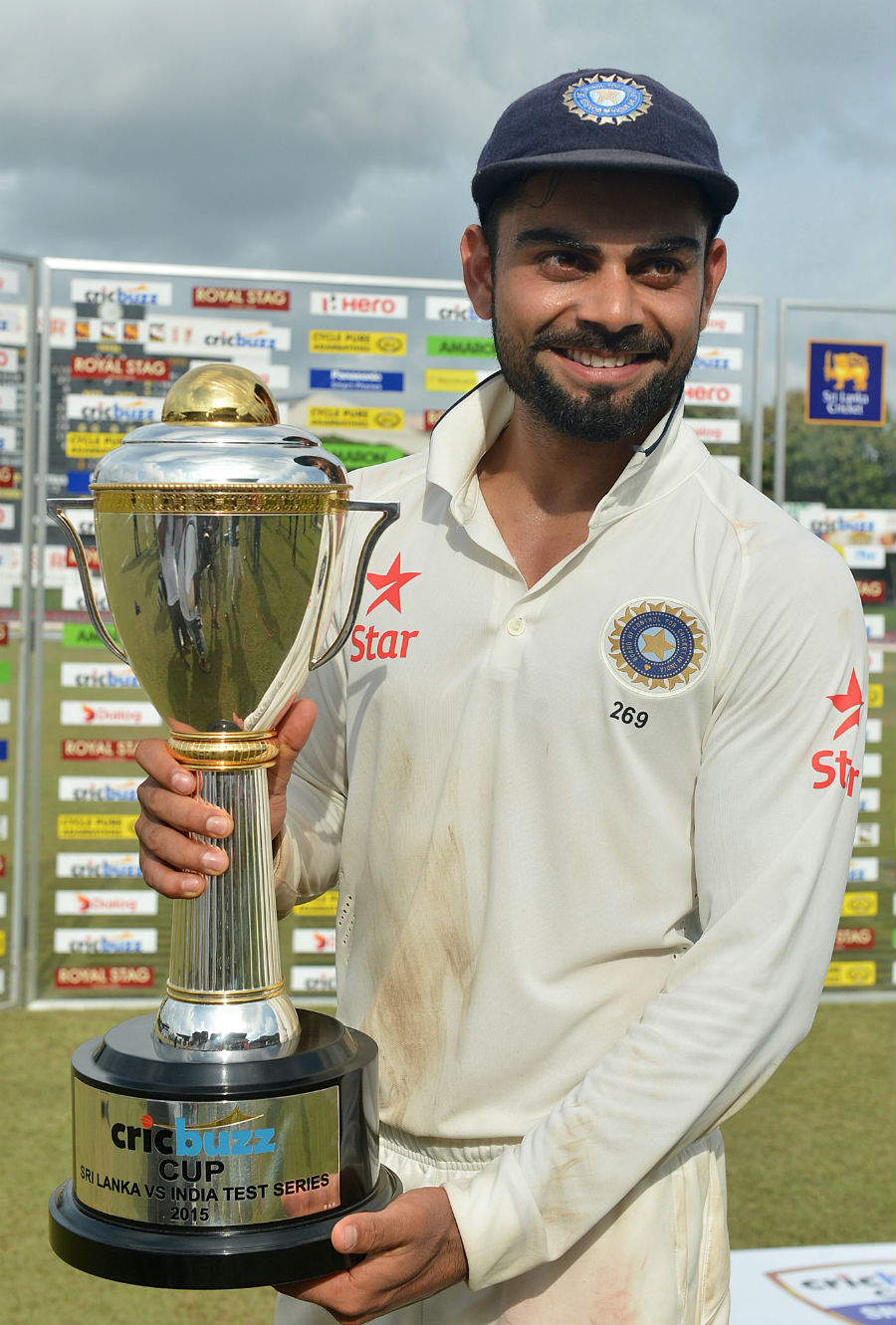 A jubilant Virat Kohli poses with the trophy on the 5th day of 3rd Test at SSC, Colombo on Tuesday.