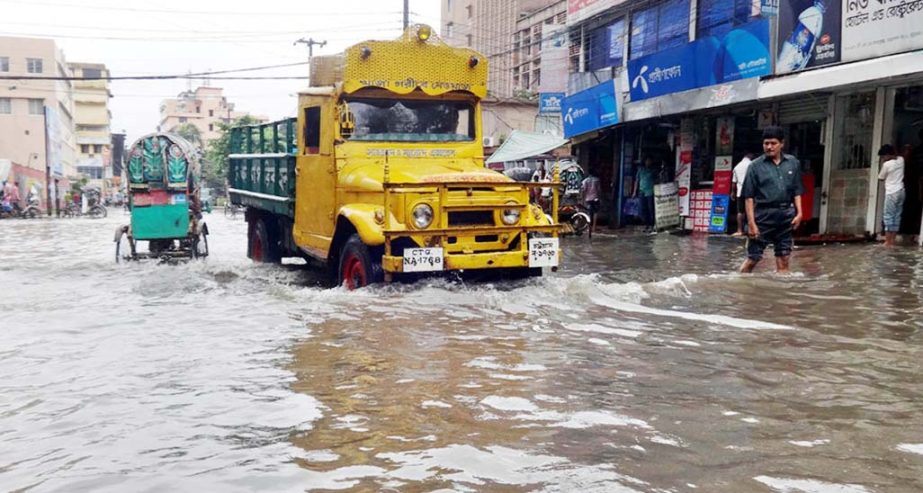 Port city's Agrabad and Halishahar areas went under water due to heavy rain yesterday.