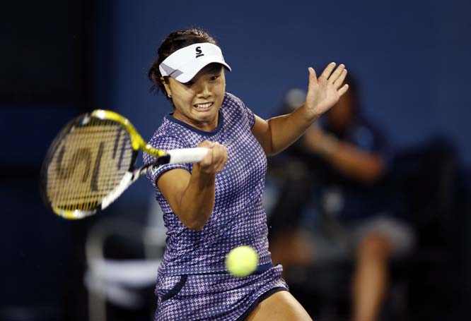 Kurumi Nara of Japan returns the ball during her first round match against Alize Cornet of France in the US Open tennis tournament in New York on Tuesday.