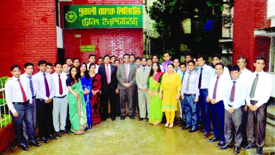 Md Abdul Halim Chowdhury, Managing Director of Pubali Bank Ltd, poses with the participants of a training on 'Foundation Training for Probationary Officers' at its Training Institute recently. Niranjan Chandra Gope, Principal of the institute, Mamun Bak