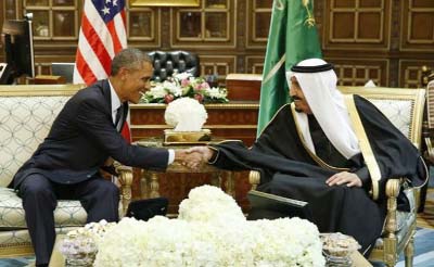 US President Barack Obama (L) shakes hands with Saudi Arabia's King Salman at the start of a bilateral meeting at Erga Palace in Riyadh.