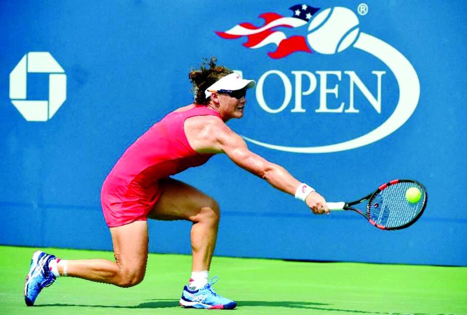 Samantha Stosur of Australia returns to Evgeniya Rodina of Russia during their 2015 US Open women's singles round 2 match at USTA Billie Jean King National Tennis Center in New York on Thursday.