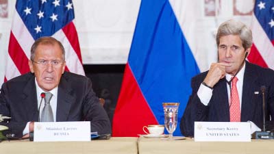 Russian Foreign Minister Sergey Lavrov(L) and US Secretary of State John Kerry seen at a meeting in Geneva.