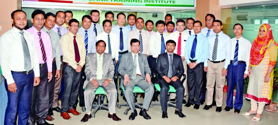 Md Nazmus Salehin, Managing Director of Standard Bank Limited, poses with the participants of a three-day long course on "Branch Management" at its Training Institute of the bank. Md Zakaria, Principal and Md Amzad Hossain Fakir, Faculty of the Institut