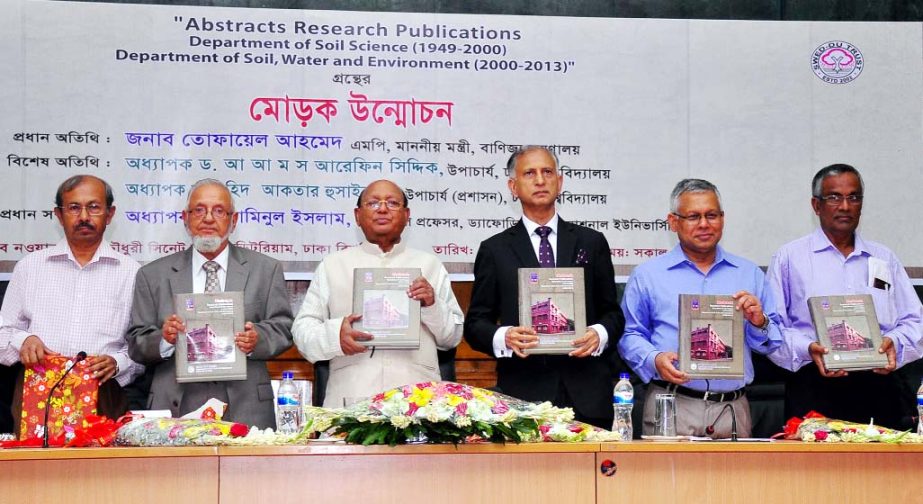 Commerce Minister Tofail Ahmed MP unveils the cover of a book titled "Abstracts of Research Publication"" as chief guest. DU Vice-Chancellor Prof. Dr. AAMS Arefin Siddique addressed the occasion as special guest."